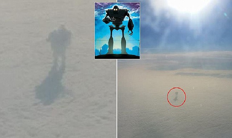 Пассажиры самолета увидели огромный шпиль, выглядывающий из облака