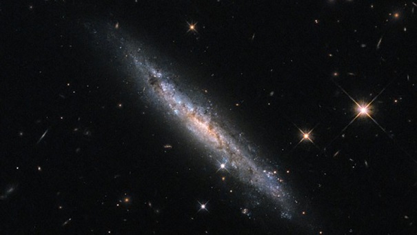 В темном омуте: NASA показало редчайший снимок взрывной галактики ESO 580-49