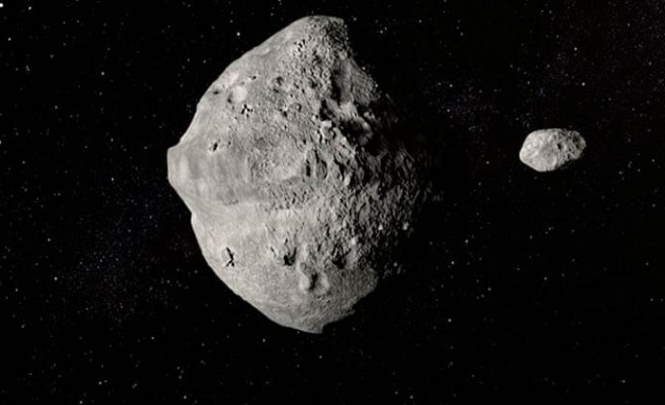 Два астероида большого диаметра летят в сторону Земли.
