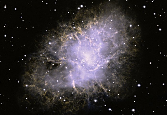 Крабовидная туманность. Крабовидная туманность - это разрушенный остаток массивной звезды, которая закончила свою жизнь в результате взрыва сверхновой. почти тысяча лет. Он расположен примерно в 6500 световых годах от Земли в созвездии Тельца.