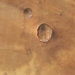 Марсианская бабочка: ударный кратер на Красной планете раскрывает секреты подземного льда