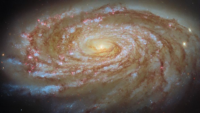 Гипнотическая спираль Вселенной: Hubble заглянул в сердце галактики M88